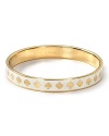 kate spade new york's playfully styled bangle is totally hue. Engraved with Live Colorfully, this gold-plated bracelet is a chic reminder to be bright.