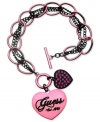 GUESS spreads the love with this toggle closure bracelet. Crafted from sprayed jet mixed metal, rose is the color of choice with the tone shining throughout, down to the sparkling accents. Approximate length: 7-1/2 inches. Approximate drop: 1 inch.