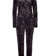 Your one stop to ultra glam lounging: Juicy Coutures wonderfully wild animal print velour romper! - Hooded, long raglan sleeves, fitted black knit cuffs, zippered front, drawstring waistband, black grosgrain trim, fitted elasticized ankles - Easy slim fit - Wear with shearling lined boots and tissue soft camis