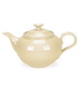 From celebrated chef and writer, Sophie Conran, comes incredibly durable dinnerware for every step of the meal, from oven to table. A ribbed texture gives this tan teapot the charming look of traditional hand thrown pottery.