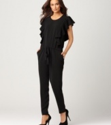 A stylish alternative to a dress, standout at the season's soirees with this DKNYC jumpsuit paired with statement extras!