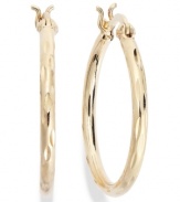 The perfect final touch. Giani Bernini's classic hoop earrings incorporate a diamond-cut design in 24k gold over sterling silver. Approximate diameter: 1 inch.