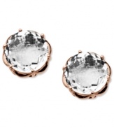 Elegant studs that pack a ton of sparkle. Town & Country's beautiful earrings combine a sterling silver and cut-out 14k rose gold setting with stunning round-cut white quartz (3-1/5 ct. t.w.). Approximate diameter: 1/3 inch.