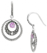 Liven your look with chic, colorful circles. Genevieve & Grace's sparkling style combines round-cut amethyst (3/4 ct. t.w.) with glittering marcasite edges. Set in sterling silver. Approximate drop length: 1-7/16 inches. Approximate drop width: 3/4 inch.