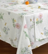 Add an air of springtime to your table with a motif of delicate flowers atop a latticework of greenery. In a soft, durable cotton blend.