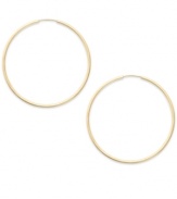 Forever stylish, forever chic. This pair of endless hoop earrings comes in 14k gold. Approximate diameter: 25 mm.