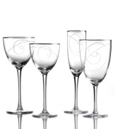 Combining a luxe platinum edge and fanciful swirls in fine crystal, the Platinum Wave wine glass from Noritake styles formal tables with refreshing elegance.