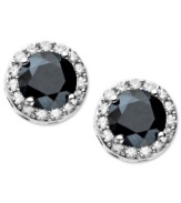 Poignant sparkle. Arabella's pretty stud earrings highlight round-cut black (4-1/2 ct. t.w.) and white (9/10 ct. t.w.) Swarovski zirconias. Set in sterling silver. Approximate diameter: 3/8 inch.