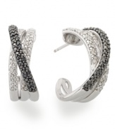 Crisscrossed and totally chic! These unique hoop earrings are highlighted by round-cut white diamonds (1/4 ct. t.w.) and black diamonds (1/4 ct. t.w.). Set in sterling silver. Approximate diameter: 3/4 inch.