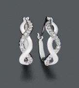 Luxurious swirls of diamond and silver are a perfect addition to your earlobes. These hoop earrings feature smooth sterling silver and round-cut diamond (1/10 ct. t.w.). Approximate diameter: 1/4 inch.