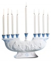 Make the festival of lights even more beautiful with an exquisite Lladro menorah. Handcrafted with embossed detail and delicate blue accents in white porcelain, it's a treasure to behold every holiday season.