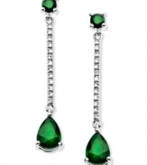 Glamorous green. These stunning sterling silver drop earrings highlight round and pear-cut emerald (1-9/10 ct. t.w.) and sparkling diamond accents. Approximate drop: 1-1/4 inches.