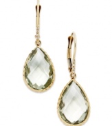 Take your look to the next level with the right amount of color. Pear-cut green quartz (10 ct. t.w.) adds the sparkle to these shining 14k gold earrings with diamond accents. Approximate drop: 1-1/4 inches.