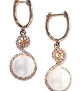 Opulent and ornate with sparkle to spare, EFFY Collection's circular drop earrings showcase cultured freshwater pearls (8-1/2-9 mm) and round-cut diamonds (1/4 ct. t.w.). Set in 14k gold. Approximate drop: 1-3/8 inches.