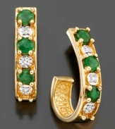 Graceful in design, these pretty hoop earrings feature round-cut emerald (1/3 ct. t.w.) and round-cut diamond accents set in 14k gold. Approximate diameter: 1/2 inch.