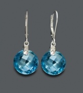 Make a vibrant statement with earrings as blue as the Caribbean. Large blue topaz gemstones (11 ct. t.w.) are accented with diamonds and set in 14k white gold. Approximate drop: 1 inch.