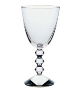 Baccarat redefines bold with the statuesque Vega wine glass. Premium crystal balancing a clear bowl and chunky, beaded stem exudes chic luxury in any setting.