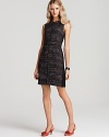 A luxe take on tweed is perfected in this office-right frock from Anne Klein.