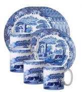 A charming rendering of the Italian countryside. Part of Spode's Blue Italian dinnerware and dishes collection, vivid hues on creamy earthenware radiate old-world charm.