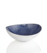 Full of surprises, this handcrafted bowl features sleek, polished aluminum lined with lustrous blue enamel. It's a striking home accent no matter what's on your menu. From the Simply Designz serveware and serving dishes collection.