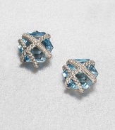 From the Cable Wrap Collection. An pretty, hexagon-shaped blue topaz stone wrapped in sterling silver cables and dazzling diamonds. Blue topazDiamonds, .07 tcwSterling silverSize, about .39Post backImported 