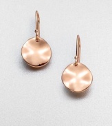 Stunning hammered discs in 18k gold and sterling silver, finished in the warm glow of 18k rose goldplating. 18k gold & sterling silver with 18k rose goldplatingLength, about .94French wireImported 