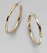 A simply chic style in radiant 18k hammered gold. 18k goldLength, about 1½Post backMade in Italy