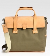 Inspired by the American hardware store aesthetic, this brief is constructed from the untanned leather reminiscent of tool belts and heavyweight, industrial canvas.Flap, zip closureDouble top handlesRemovable shoulder strapExterior patch pocketInterior zip pocketLeather/canvas13W x 15H x 4DImported