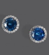 Add a touch of royalty to your look. EFFY Collection's standout stud earrings combine round-cut blue diamond (1-5/8 ct. t.w) with halos of sparkling round-cut white diamonds (1/6 ct. t.w.). Set in 14k white gold. Approximate diameter: 5/16 inch.