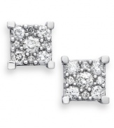 A bright burst of sparkle lights up any look. Crafted in 14k white gold, chic clusters of round-cut diamonds (1/2 ct. t.w.) adorn these beautiful stud earrings. Approximate diameter: 7-1/2 mm.