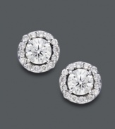 Style fit for a star. Wear this sparkling pair for any occasion, but be prepared to turn heads. Round-cut diamonds (2 ct. t.w.) shine amongst a halo of diamond accents. Crafted in 14k white gold. Approximate diameter: 9-2/10 mm.