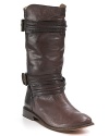 Elegant stitching adds luxe texture to these lush leather boots. The low heels lends an air of casual, cool chic. By Frye.