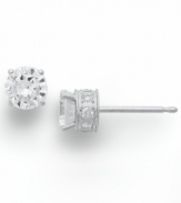 Diamond stud earrings have never sparkled so bright. This unique style features a round-cut diamond at center with a row of round-cut diamonds in the post (1/2 ct. t.w.). Four-prong setting crafted in 14k white gold. Approximate diameter: 3-4/5 mm.