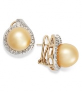 A simple, elegance-inspiring style. These stunning stud earrings features a golden South Sea pearl (11-12 mm) and a halo of diamonds (3/4 ct. t.w.) in 14k gold. Approximate diameter: 14 mm.