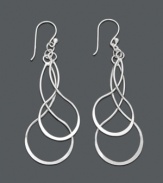 Spin a stylish tale. Unwritten earrings feature an artsy design in twisting sterling silver. Approximate drop: 2-1/4 inches.