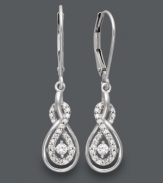 Elegance comes easy in these evening-ready drop earrings by Wrapped in Love™. Swirls of round-cut diamonds (1/4 ct. t.w.) shine bright against a polished 14k white gold setting. Approximate drop: 1 inch.