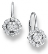 A bright burst of sparkle lights up any look. Crafted in 14k white gold, chic clusters of round-cut diamonds 1/4 ct. t.w.) adorn these beautiful drop earrings. Approximate drop: 1/2 inch.