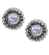 Add special flair to any look in chic sunbursts of sparkle. Betsey Johnson stud earrings highlight pretty round-cut crystals encircled by small crystal halos. Crafted in hematite tone mixed metal. Approximate diameter: 3/4 inch.