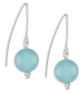 Lingering luster. Simply elegant and natural in look, these blue chalcedony (10 mm) hook earrings provide a bit of color atop any formal or casual dress. Earrings set in sterling silver. Approximate drop: 1-1/2 inch.