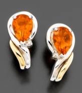 Dare to be different with brilliant citrine (1-1/5 ct. t.w.) earrings. The pear-shaped stones are completed with round-cut diamond accents, 14k gold & sterling silver. Approximate length: 1/2 inches.