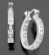 A classic way to lend sparkle to any outfit. These graceful hoop earrings by B. Brilliant feature round-cut cubic zirconia (2-1/3 ct. t.w.) along its length. Measures approximately 1/2 inches in diameter.