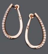 Timeless hoops with an extra pop of sparkle. Crafted in 14k rose gold with a chic oval shape, earrings feature dozens of round-cut diamonds (1/4 ct. t.w.). Approximate diameter: 7/8 inch.