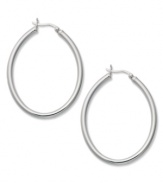 Style perfection. Touch of Silver's oval-shaped hoops are crafted in silver-plated brass with a sterling silver click backing. Approximate diameter: 1-1/3 inches.