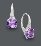 The perfect gift for the February birthday girl! These dramatic drop earrings shine with the addition of vibrant, amethyst birthstones (2-9/10 ct. t.w.) and sparkling diamond accents. Crafted in 14k white gold. Approximate drop: 1/2 inch.