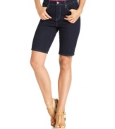 Levi's Bermuda shorts in dark denim have a bit of stretch to hug your curves and instantly elongate your legs. Try them with wedges for night and flats for day!