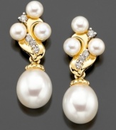 Finish your evening look with the timeless sophistication of sparkling diamonds and pearls. These earrings feature cultured freshwater pearl (9 mm and 4 mm) and round-cut diamonds (1/6 ct. t.w.) set in 14k gold. Approximate drop: 1 inch.