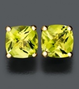 A gift for an August birthday girl, or a colorful pair of gems to brighten your own day. Cushion-cut peridot stud earrings set in 14k gold (2 ct. t.w.).