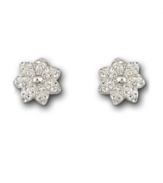 Fanciful flowers. The petite and sparkling Liddy Pierced Earrings features a a sparkling flower motif. Each one is set in clear Swarovski crystals with Swarovski's signature Pointiage® technique. Crafted in silver tone mixed metal. Approximate diameter: 3/8 inch.