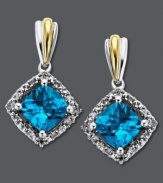 Dramatic dazzle. Cushion-cut blue topaz (2 ct. t.w.) and sparkling diamond accents stun on these unique diamond-shaped drop earrings. Crafted in 14k gold and sterling silver. Approximate drop: 3/4 inches.