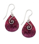 Add vibrance to your look with a drop of color. Jody Coyote's teardrop-shaped earrings feature burgundy patina with swirling sterling silver accents and french wire. Approximate drop: 1-1/4 inches.